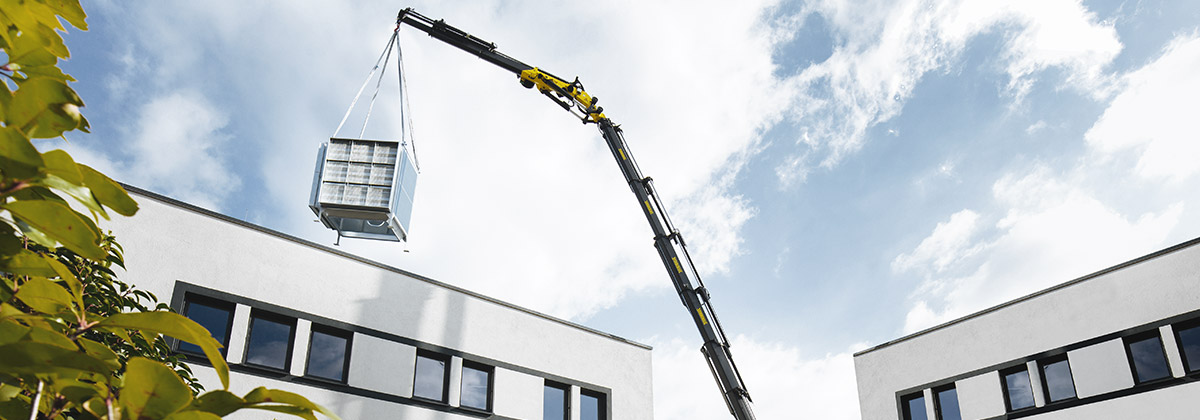 Kranservice – Transport Gebäudetechnik auf Dach
